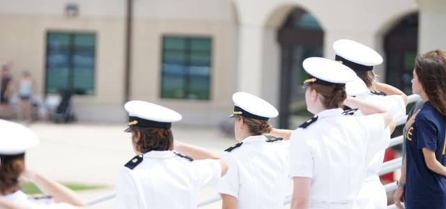 Navy Officers in White saluting